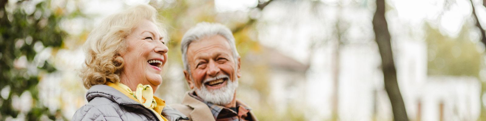 Smiling senior couple enjoying time together outdoors
